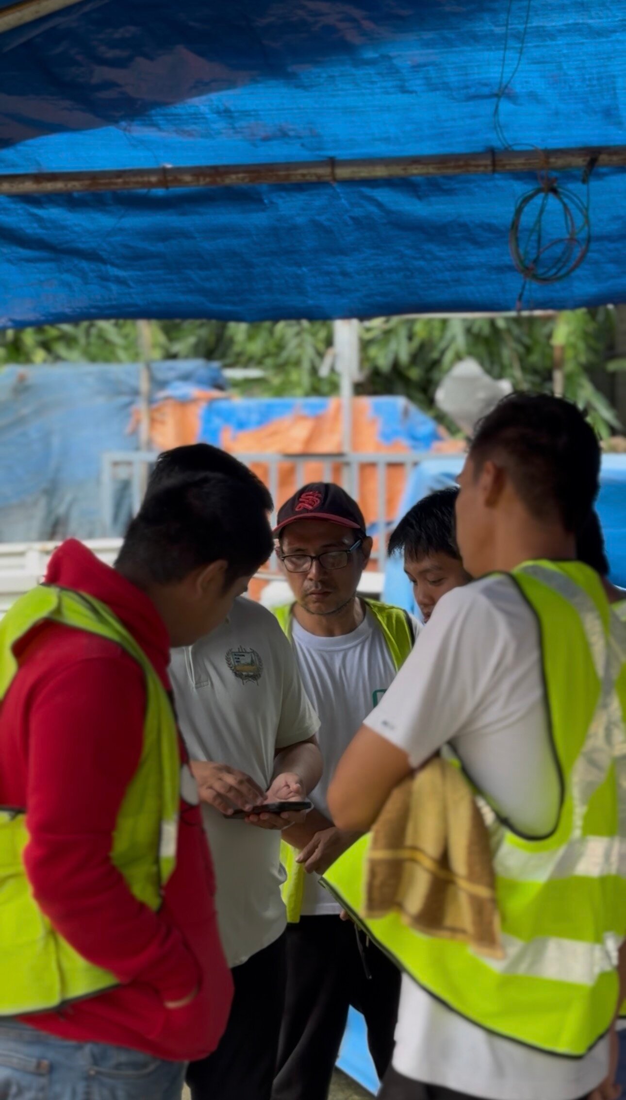 Members of the BES service team together at a work site